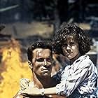 Alyssa Milano and Arnold Schwarzenegger in Commando (1985)