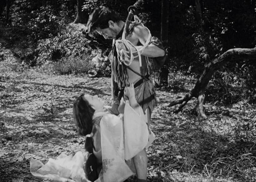 Toshirô Mifune and Machiko Kyô in Rashomon (1950)