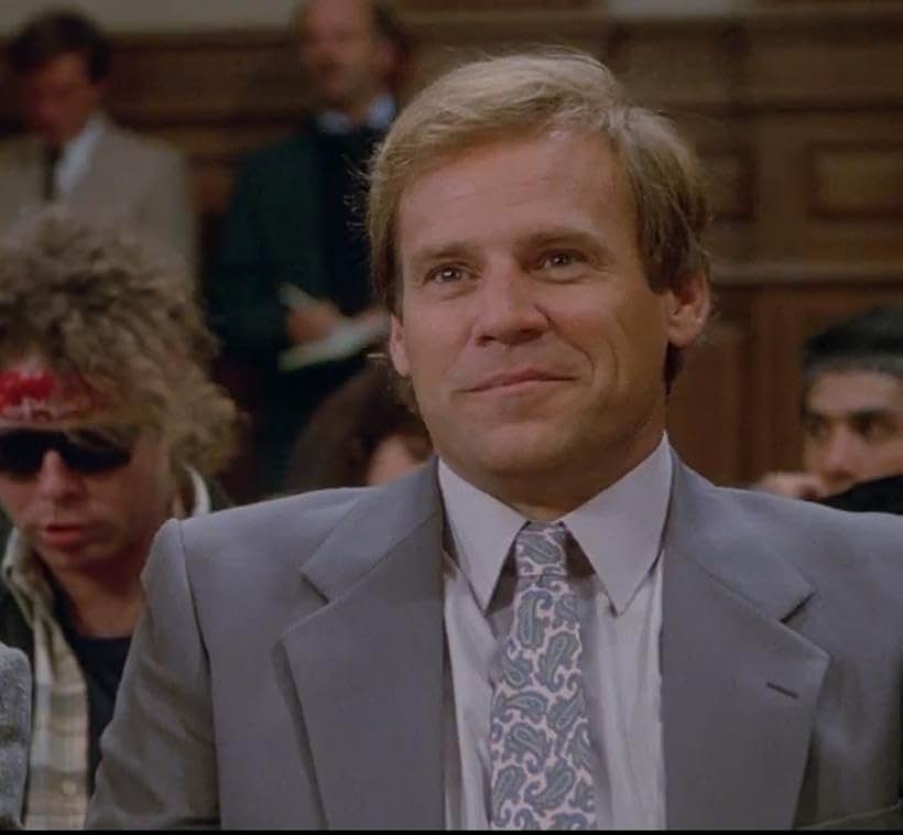 Don Stroud in Armed and Dangerous (1986)