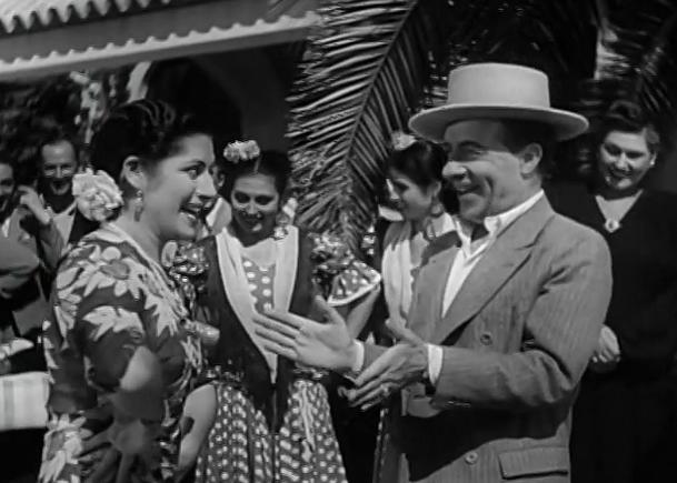 Miguel Ligero and Juanita Reina in Macarena (1944)