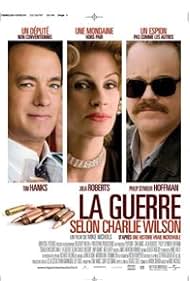 Tom Hanks, Julia Roberts, and Philip Seymour Hoffman in La Guerre selon Charlie Wilson (2007)