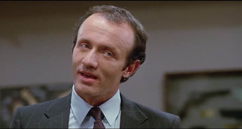 Jonathan Banks in Armed and Dangerous (1986)