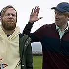 Domhnall Gleeson and Brian Gleeson in Frank of Ireland (2021)