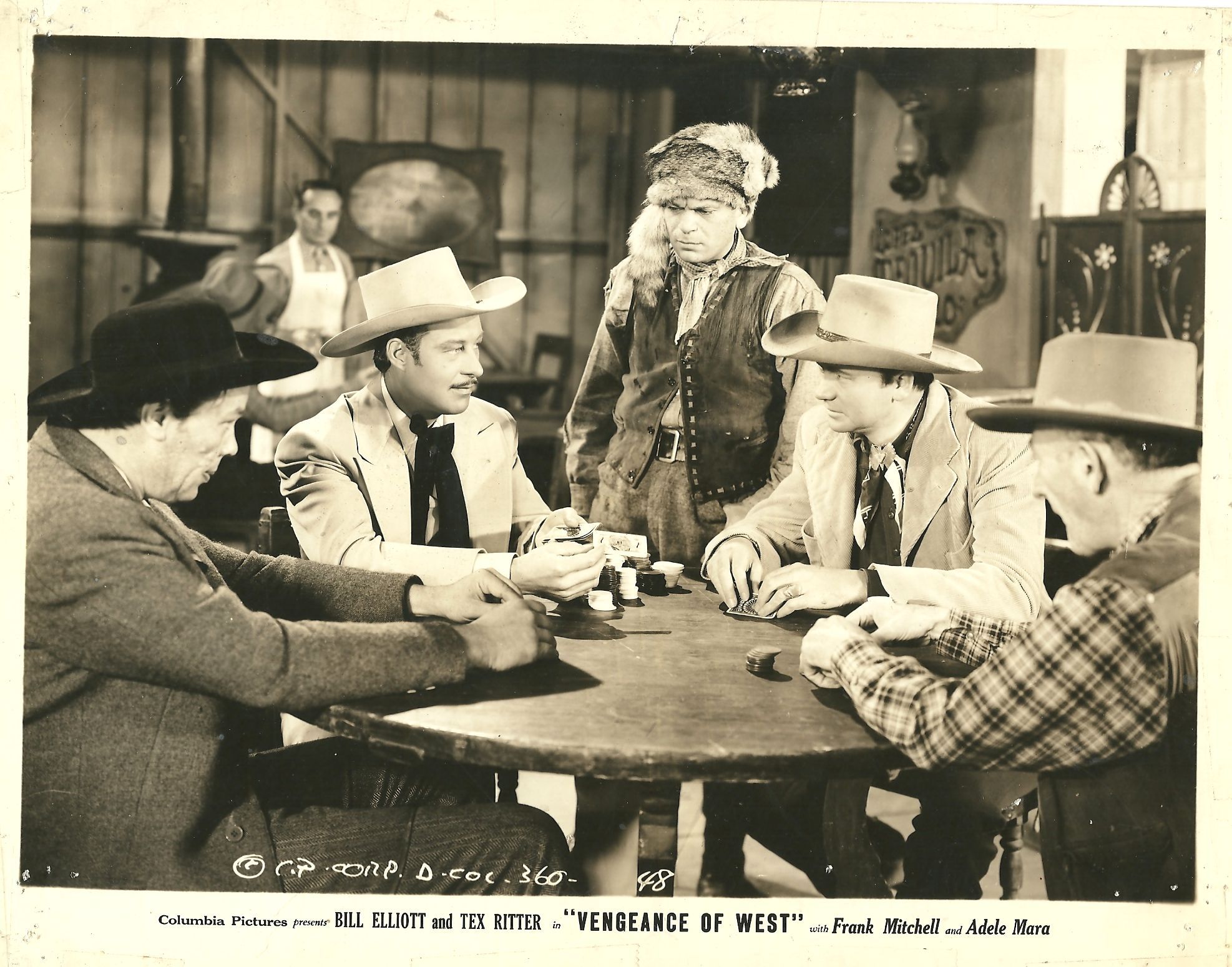 Dick Curtis, Bill Elliott, Frank Mitchell, Tex Ritter, and John Tyrrell in Vengeance of the West (1942)