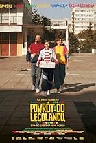 Maciej Stuhr, Teodor Koziar, and Weronika Ksiazkiewicz in Return to Legoland (2021)