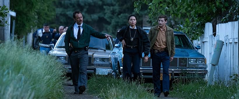 Jude Law, Jurnee Smollett, and Tye Sheridan in The Order (2024)