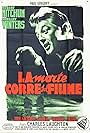 Robert Mitchum in La morte corre sul fiume (1955)