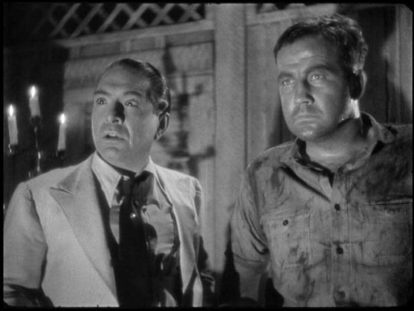 Broderick Crawford and J. Carrol Naish in Island of Lost Men (1939)