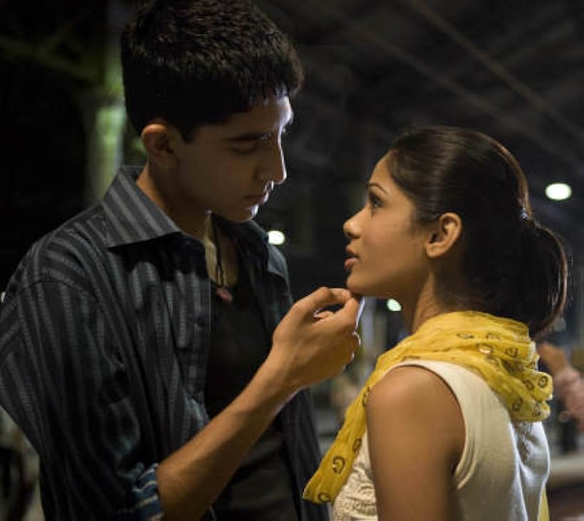 Dev Patel and Freida Pinto in Slumdog Millionaire (2008)