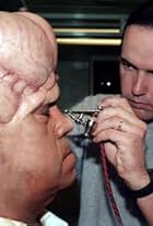 Michael Burnett applies John Schuck's alien make-up for an episode of "Cousin Skeeter".