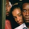 Don Cheadle, Antonio David Lyons, and Sophie Okonedo in Hotel Rwanda (2004)