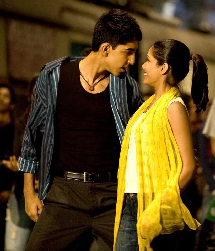 Dev Patel and Freida Pinto in Slumdog Millionaire (2008)