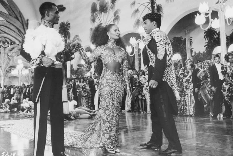 Eddie Murphy, Vanessa Bell Calloway, and Calvin Lockhart in Coming to America (1988)