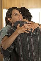 Elizabeth Rodriguez and Lorenzo James Henrie in Fear the Walking Dead (2015)