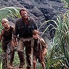 Sam Neill, Ariana Richards, and Joseph Mazzello in Jurassic Park (1993)