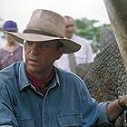 Sam Neill, Ariana Richards, and Martin Ferrero in Jurassic Park (1993)