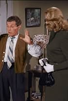 Elizabeth Montgomery and Walter Burke in Bewitched (1964)