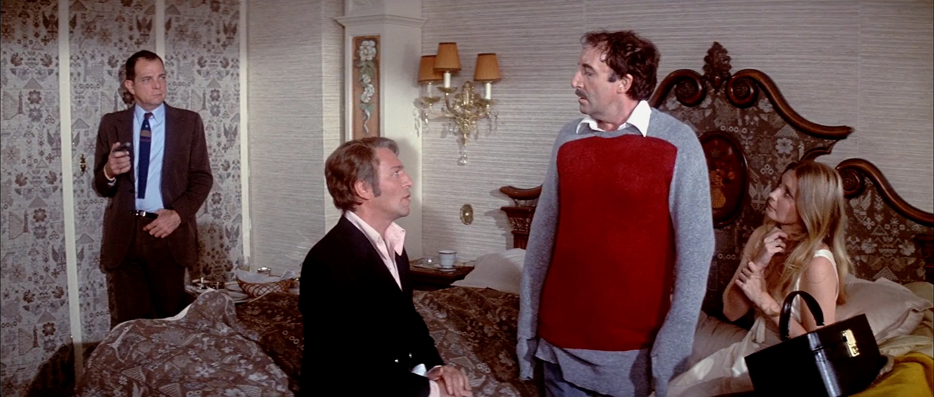 Peter Sellers, Christopher Plummer, Peter Arne, and Catherine Schell in The Return of the Pink Panther (1975)