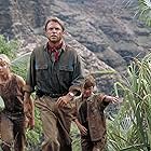 Sam Neill, Ariana Richards, and Joseph Mazzello in Jurassic Park (1993)