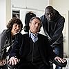 François Cluzet, Anne Le Ny, and Omar Sy in Intouchables (2011)