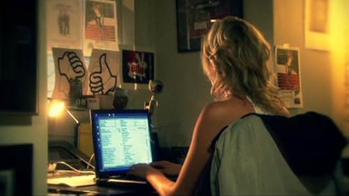 Paula Christina (P.C.) has lost patience with her boyfriend Max's obsession with his Whitelight laptop; for her, a computer is just a stupid computer.  But when she kills Max to end his prattling, his laptop grows teeth and seeks to avenge his death. 