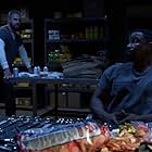 Michael Jai White and Stephen Amell in Arrow (2012)