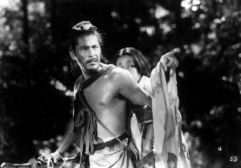 Toshirô Mifune and Machiko Kyô in Rashomon (1950)