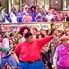 Fat Albert (Kenan Thompson, front, center) and friends wow partygoers with their dance moves.