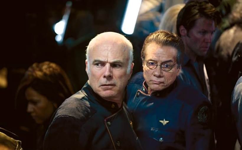 Edward James Olmos and Michael Hogan in Battlestar Galactica: The Plan (2009)