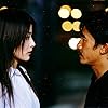 Kelly Chen and Tony Leung Chiu-wai in Mou gaan dou (2002)