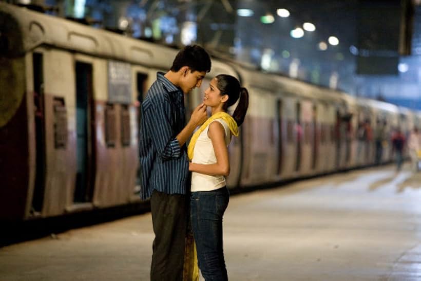 Dev Patel and Freida Pinto in Slumdog Millionaire (2008)