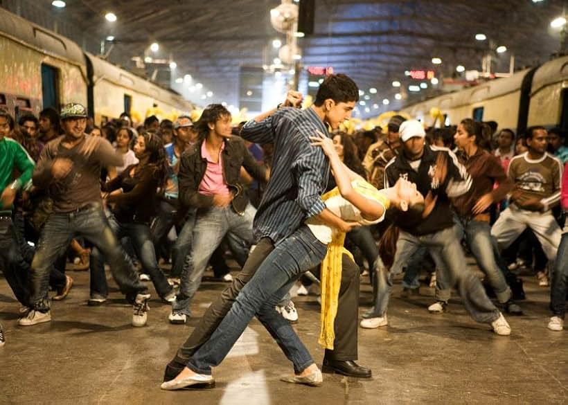 Dev Patel and Freida Pinto in Slumdog Millionaire (2008)