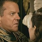 Kiefer Sutherland and Emily Browning in Pompeii (2014)