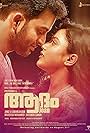 Prithviraj Sukumaran and Mishti Chakravarty in Adam Joan (2017)