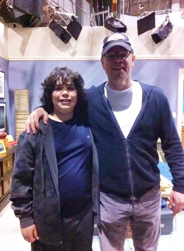 Cyrus Arnold with executive producer Matt Damon on the set of the CBS sitcom pilot "More Time With Family".  