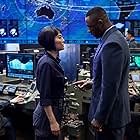 Idris Elba and Rinko Kikuchi in Pacific Rim (2013)