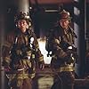 John Travolta and Joaquin Phoenix in Ladder 49 (2004)