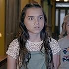 Madeleine McGraw and Landon Gordon in Secrets of Sulphur Springs (2021)