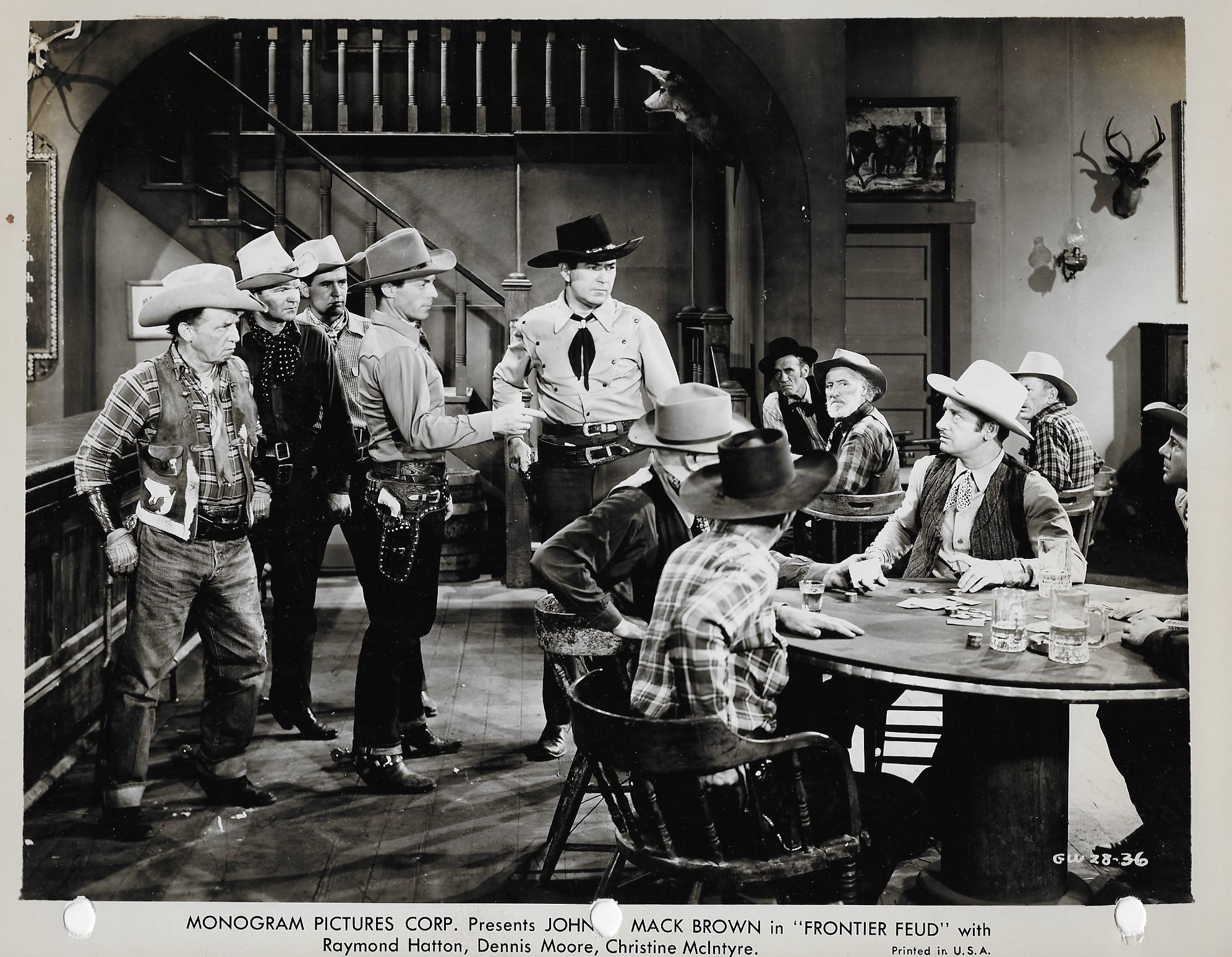 Johnny Mack Brown, Rube Dalroy, Terry Frost, Raymond Hatton, Jack Ingram, Dennis Moore, and Jack Hendricks in Frontier Feud (1945)