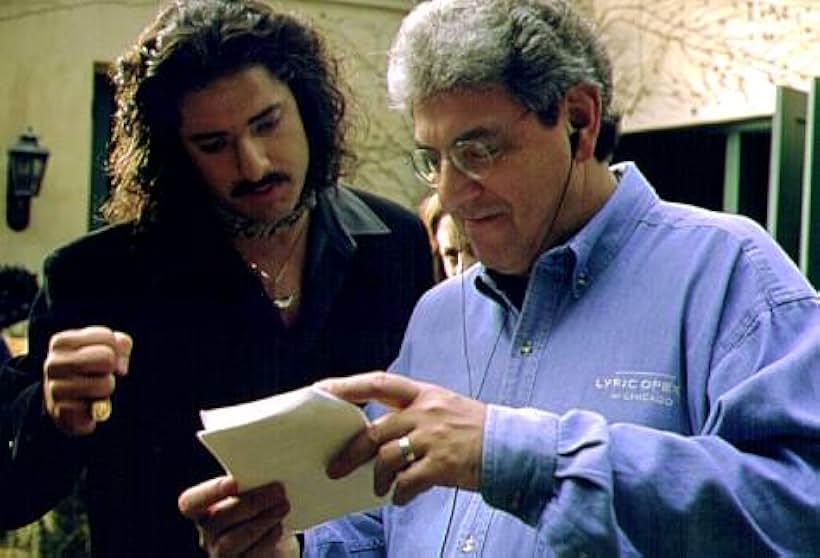 Brendan Fraser consults with director Harold Ramis