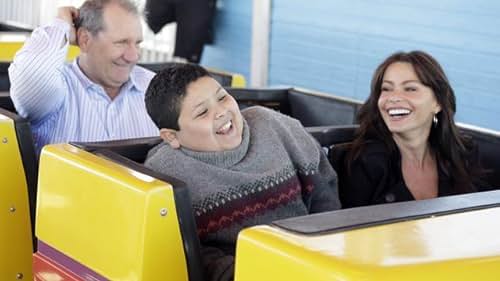 Sofía Vergara, Ed O'Neill, and Rico Rodriguez in Modern Family (2009)