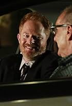 Jesse Tyler Ferguson and Ed O'Neill in Modern Family (2009)