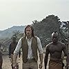 Samuel L. Jackson, Alexander Skarsgård, Mens-Sana Tamakloe, Osy Ikhile, and Antony Acheampong in The Legend of Tarzan (2016)