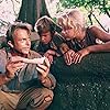 Sam Neill, Ariana Richards, and Joseph Mazzello in Jurassic Park (1993)