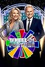 Vanna White and Pat Sajak in Wheel of Fortune (1983)