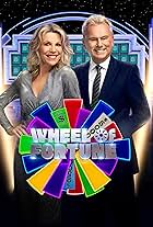 Vanna White and Pat Sajak in Wheel of Fortune (1983)