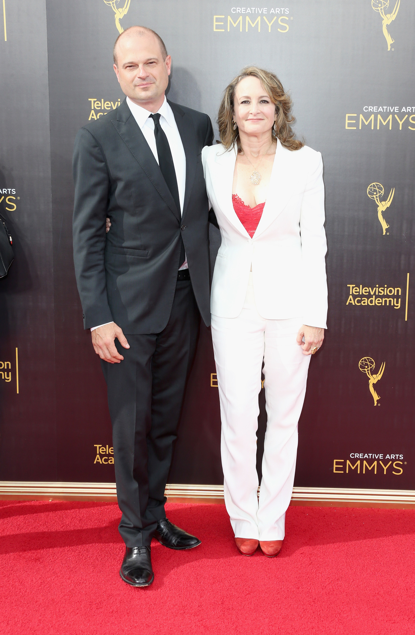 Brad Simpson and Nina Jacobson at an event for The 68th Primetime Emmy Awards (2016)