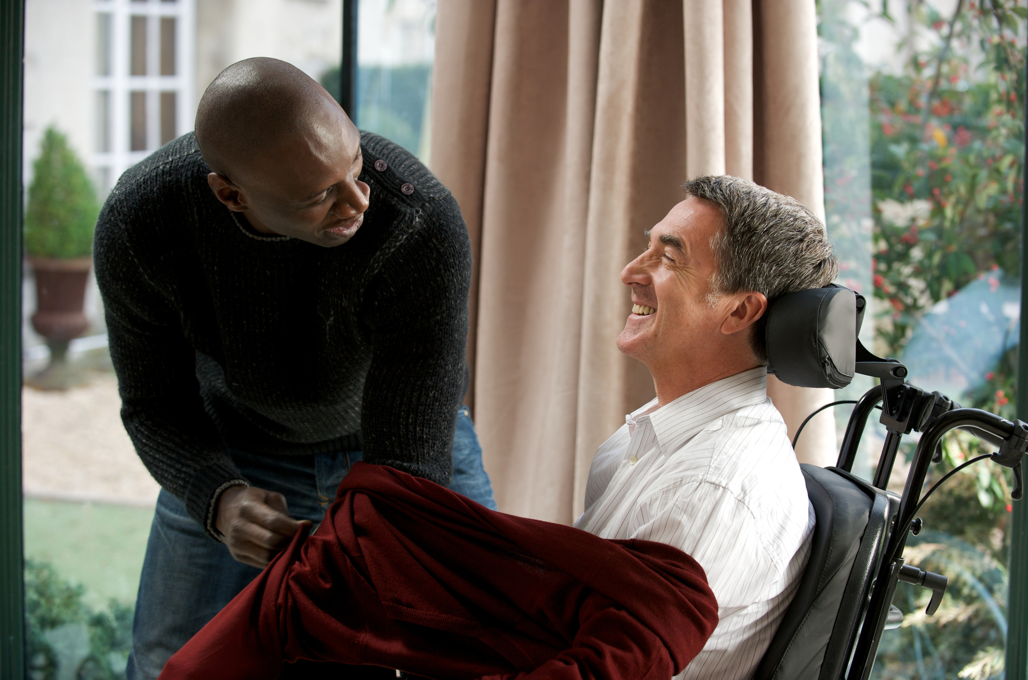 François Cluzet and Omar Sy in Intouchables (2011)