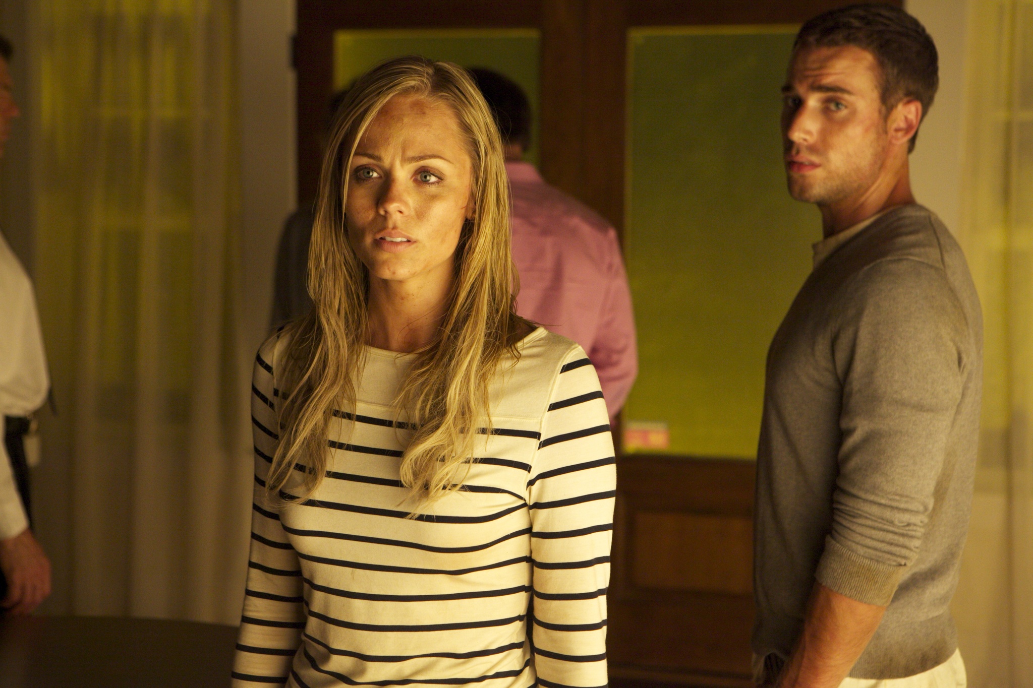 Laura Vandervoort and Dustin Milligan in The Entitled (2011)