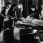 Kevin Bacon, Julia Roberts, William Baldwin, Kiefer Sutherland, and Oliver Platt in Flatliners (1990)